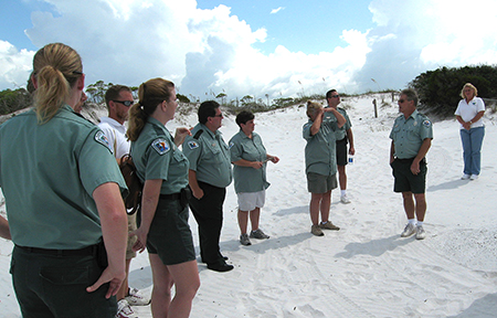 Park rangers on the beach